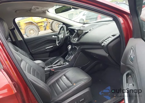 2015 Ford Escape Titanium z USA, uszkodzony, nr VIN 1FMCU9J98FUC84963